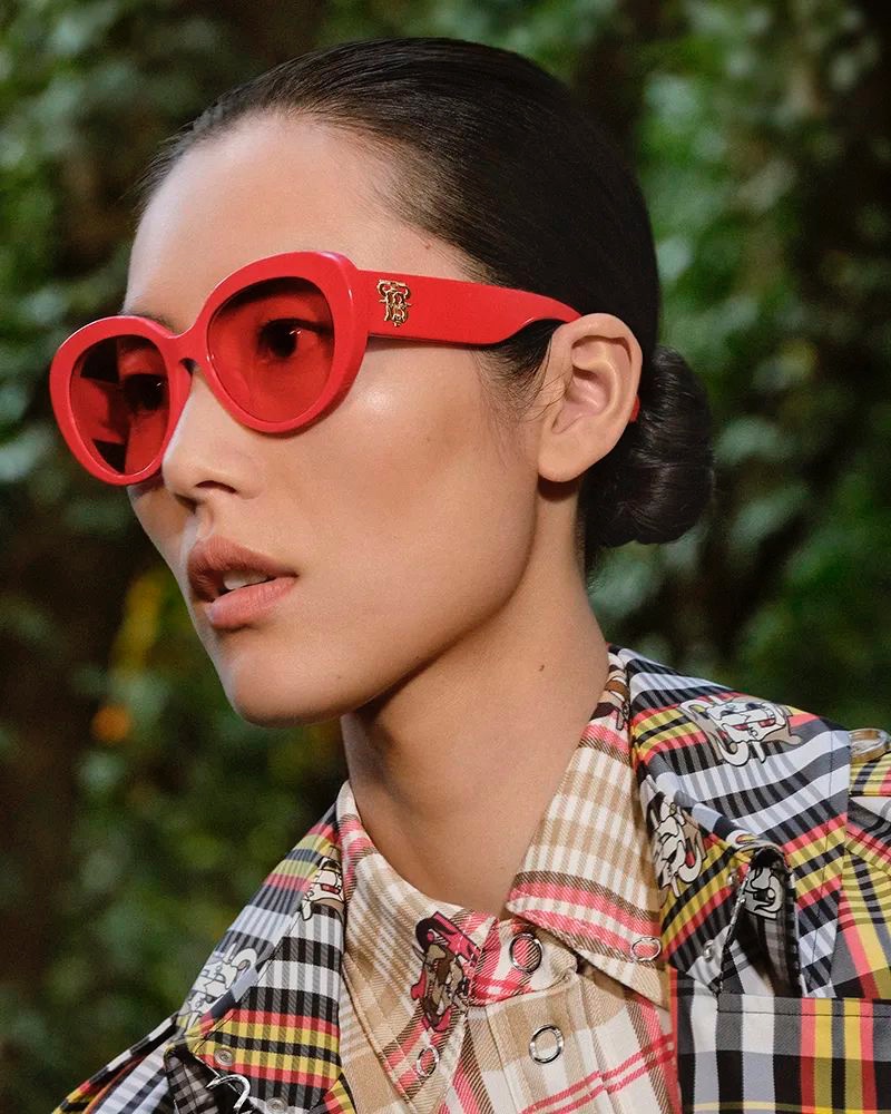 Liu Wen wears red sunglasses in Burberry Chinese New Year 2021 campaign.