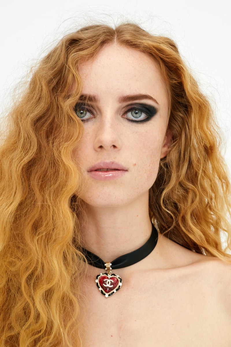 Rianne van Rompaey models necklace from Chanel pre-fall 2021 collection.