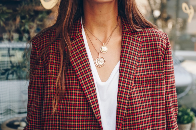 Closeup Woman Red Checkered Plaid Blazer Coin Necklaces Jewelry