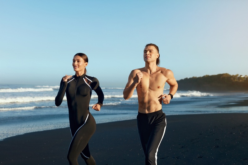 Couple Running Beach Stylish Workout Clothes