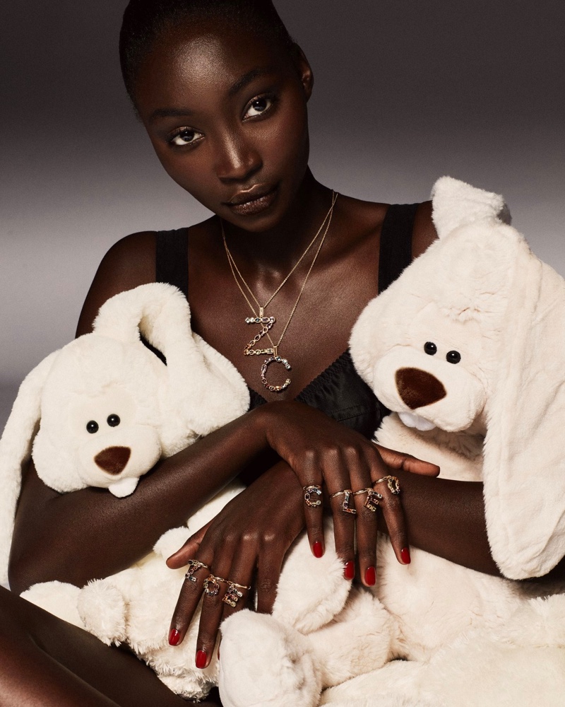 Diarra Ndiaye stars in Dolce & Gabbana Alphabet jewelry collection.