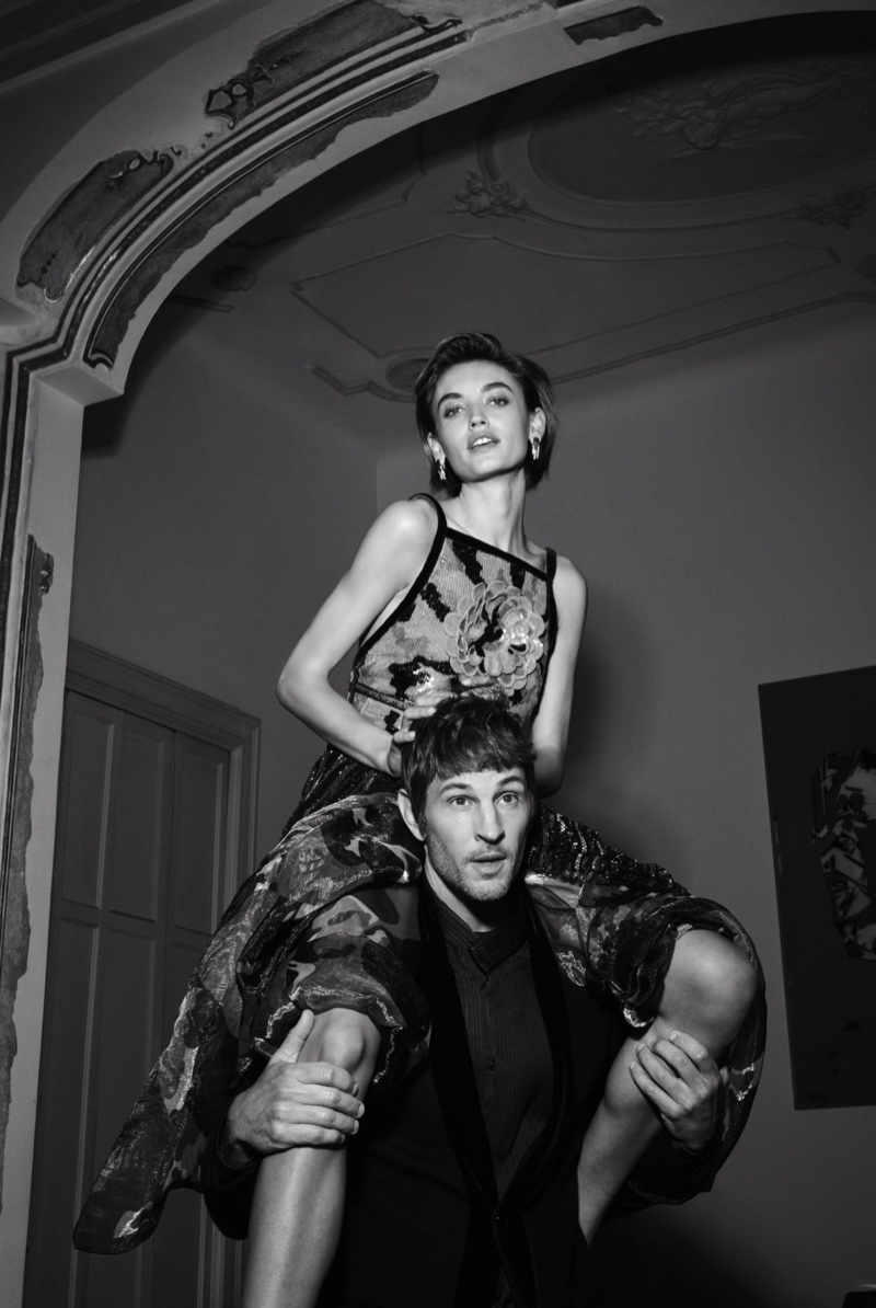 Beatrice Brusco poses on Kelly Rippy’s shoulders for Giorgio Armani Holiday 2020 campaign.