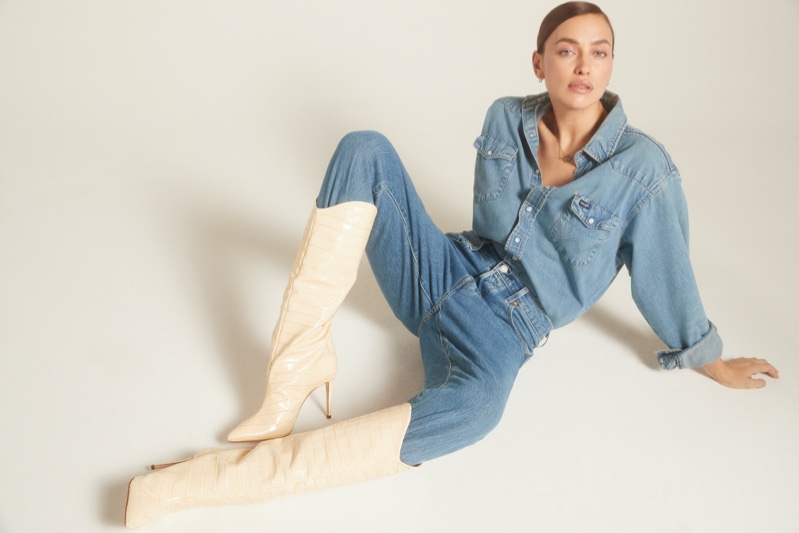 Rocking a denim on denim look, Irina Shayk fronts Schutz Holiday 2020 campaign.