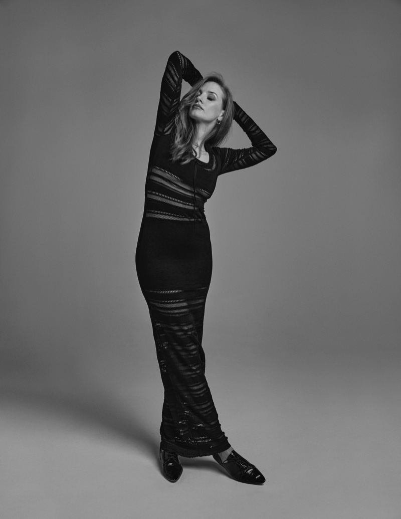 Photographed in black and white, Jessica Chastain strikes a pose in a long-sleeve dress. Photo: David Roemer