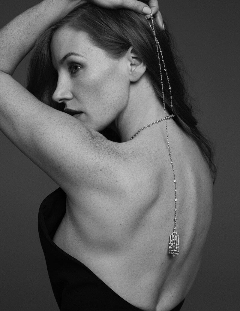 Showing off her back, Jessica Chastain poses in Celine halter neck dress with Piaget jewelry. Photo: David Roemer