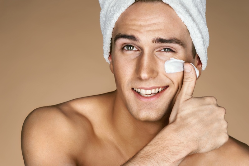 Man Applying Face Cream Skincare