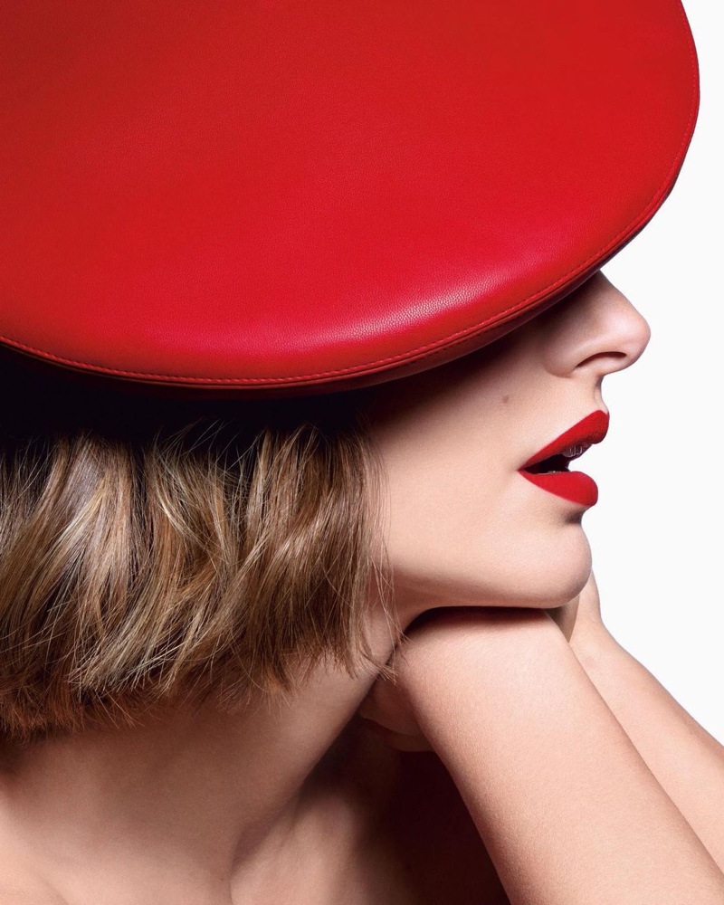 Wearing vegan accessories, actress Natalie Portman fronts Dior Rouge Dior 2021 lipstick campaign.