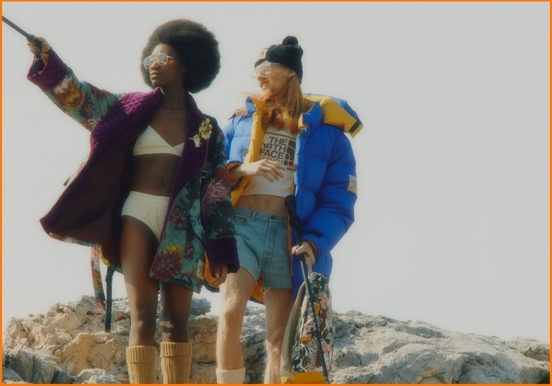 Models pose in The Alps for The North Face x Gucci campaign.