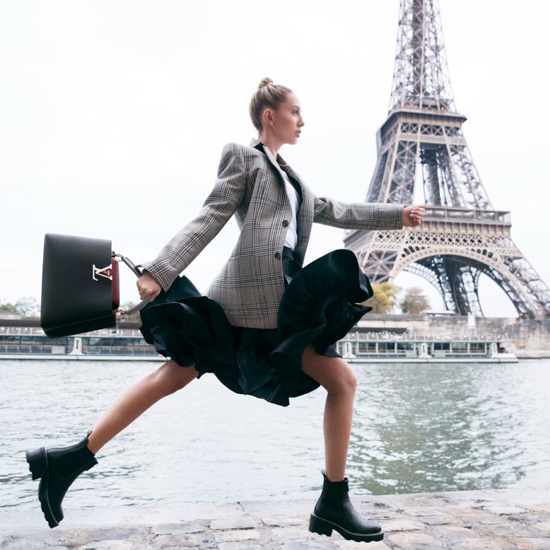 Posing near the Eiffel Tower, Princess Olympia Greece fronts Louis Vuitton Capucines bag campaign.