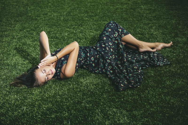 Woman Printed Dress Laying Grass Lawn
