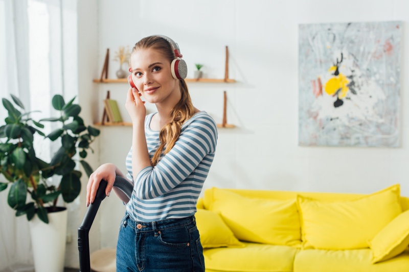 Blonde Woman Vacuuming Earphones House