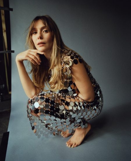 Elizabeth Olsen Embraces Retro Looks for ELLE Clad in silver, Elizabeth Olsen wears Paco Rabanne look. Photo: Amar Daved