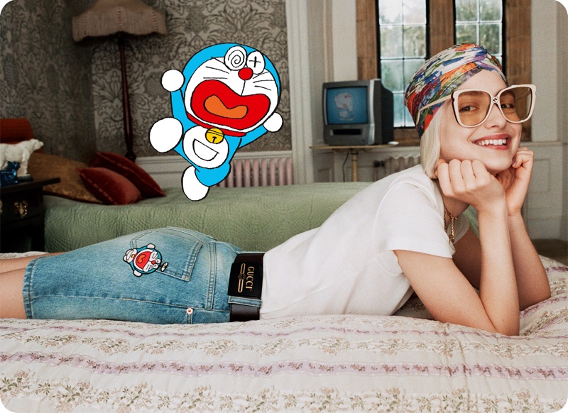 A model is all smiles wearing the Doraemon x Gucci collaboration.