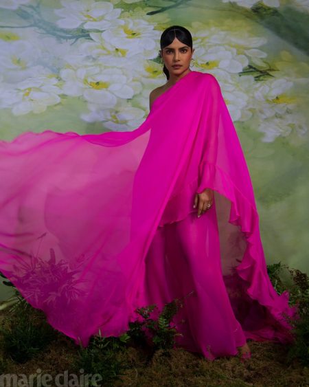 Priyanka Chopra Wears Spring Style for Marie Claire Draped in hot pink, Priyanka Chopra wears Valentino dress, Cartier jewelry, and Jimmy Choo heels.