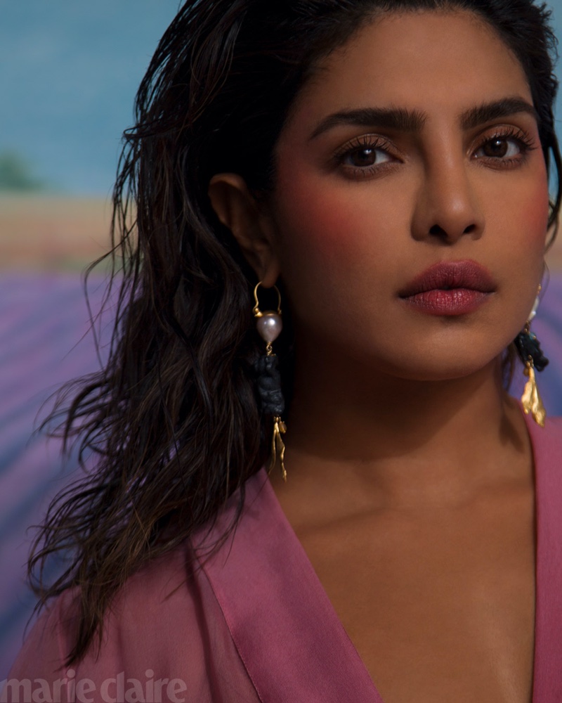 Ready for her closeup, Priyanka Chopra wears Dior dress and earrings.