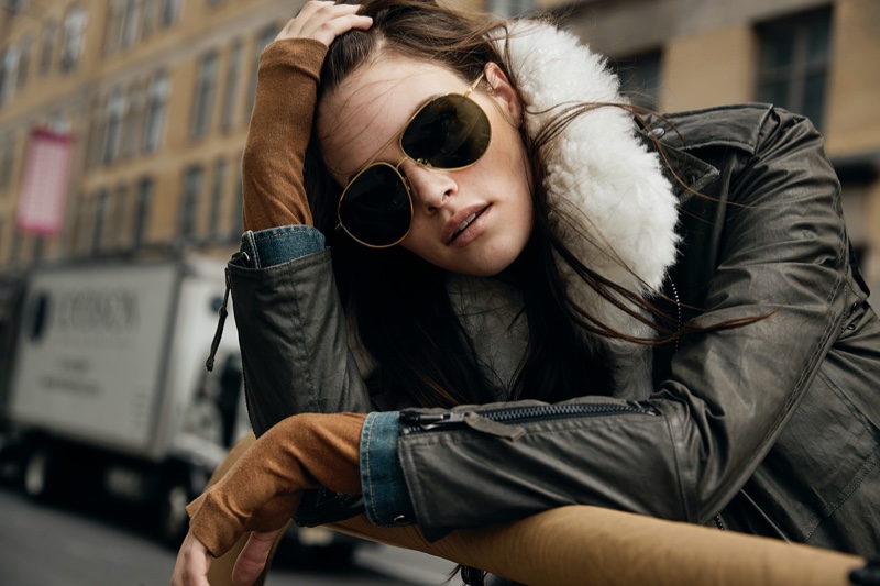 Rocking aviator sunglasses and a shearling jacket, Vanessa Moody poses in SAM fall-winter 2020 campaign.