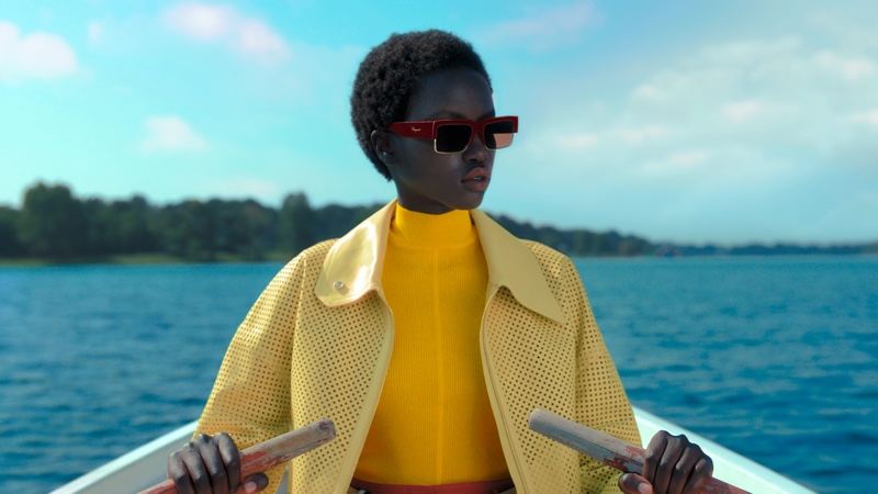 Anok Yai shines in vibrant style for Salvatore Ferragamo spring-summer 2021 campaign.