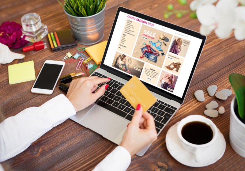 Woman Browsing Clothing Store Online Desk Laptop