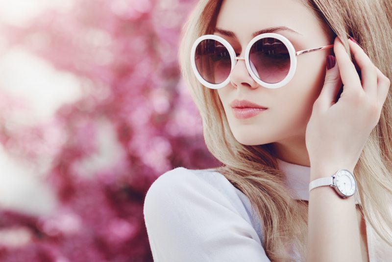 Woman in Matching Sunglasses and Watch