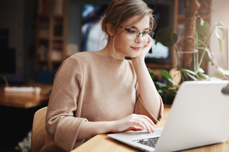 Attractive Woman Looking Laptop Wearing Glasses