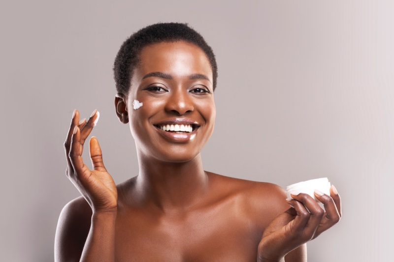 Black Model Short Natural Hair Skincare Product Smile