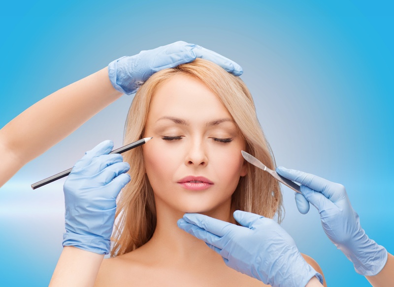 Blonde Woman Plastic Surgery Gloves Scalpel Concept