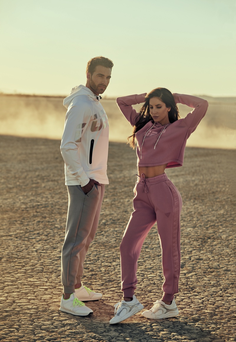 Jen Selter poses with Nic Palladino for Guess activewear spring 2021 campaign.