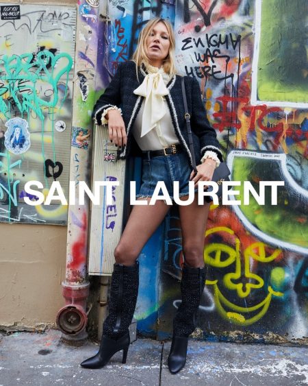 Posing next to graffiti, Kate Moss fronts Saint Laurent spring 2021 campaign.