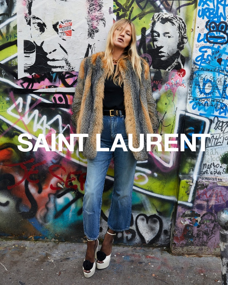 Rocking fur and denim, Kate Moss appears in Saint Laurent spring 2021 campaign.