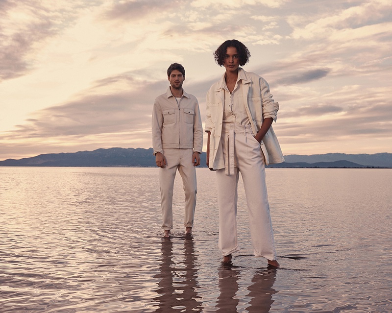 Models pose in white looks for Mango Denim spring 2021 campaign.