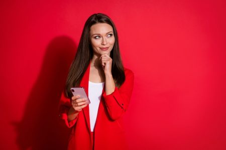 5 Best Languages to Learn for Business Thinking Woman Red Suit Phone Attractive