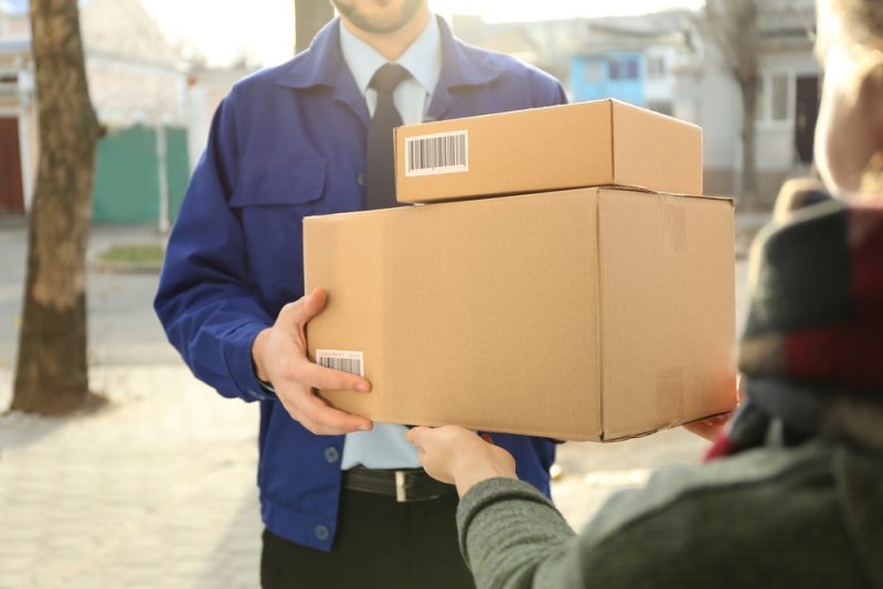 Woman Receiving Packages at Home