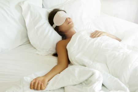 Melatonin for Sleep: Does It Work? Woman Sleeping with Eye Mask