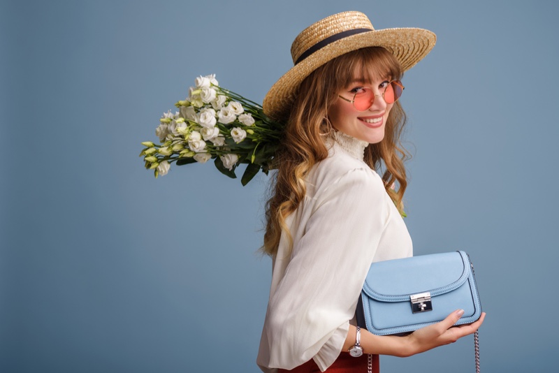 Woman Smiling Flowers Blue Bag Blouse Straw Hat