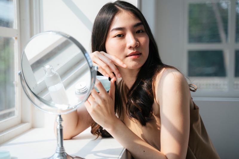 Asian Model Magnified Mirror Skin