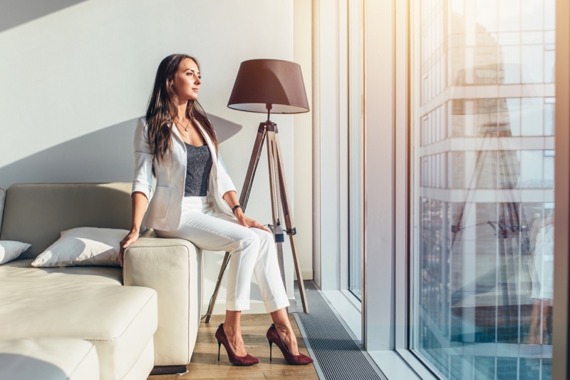 Attractive Woman Suit Looking Out Window Sun