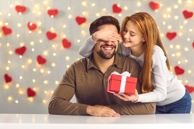 Couple Woman Giving Man Gift Box