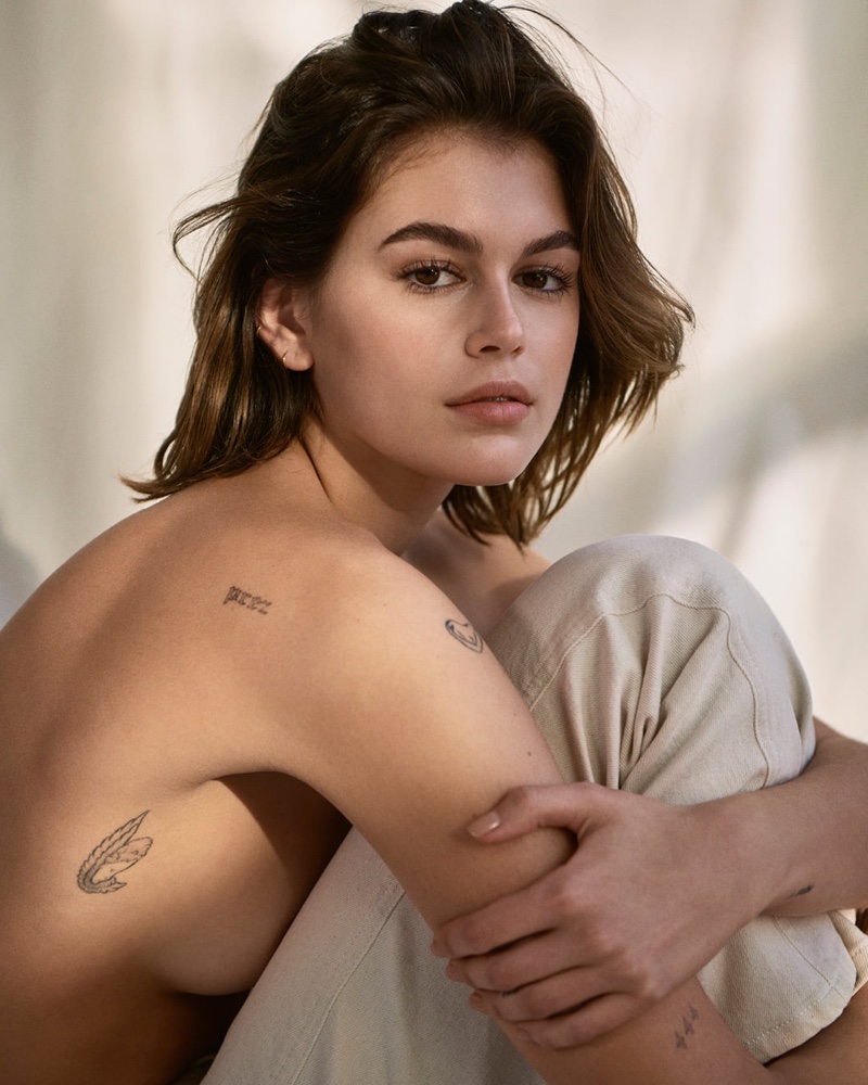 Posing topless, Kaia Gerber models Calvin Klein jeans. 