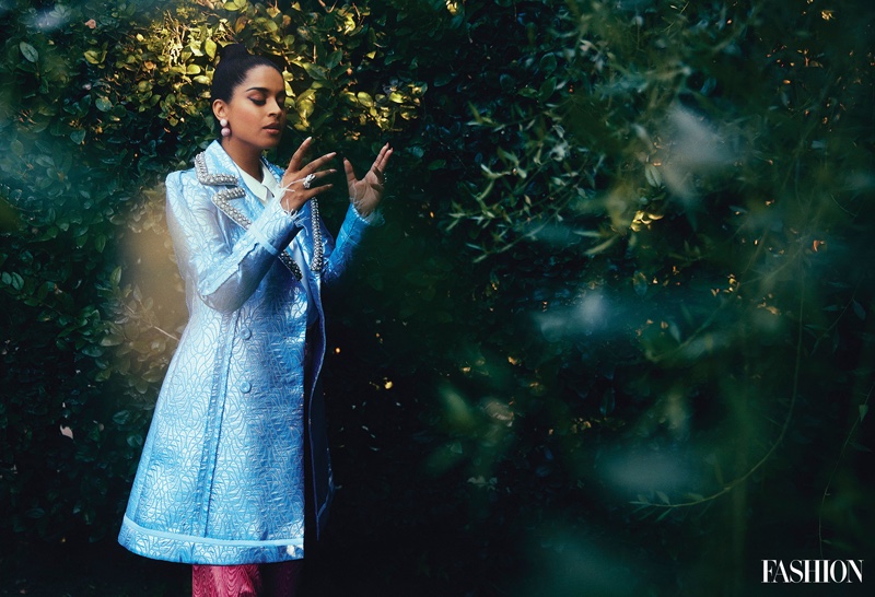 Lily Singh wears Moschino Couture coat, Cinq a Sept Top, and Jonathan Simkhai pants. Photo: Austin Hargrave