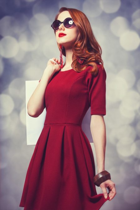 Is Fashion Shopping an Unrecognized Art? Model Red Dress Shopping Bag Sunglasses
