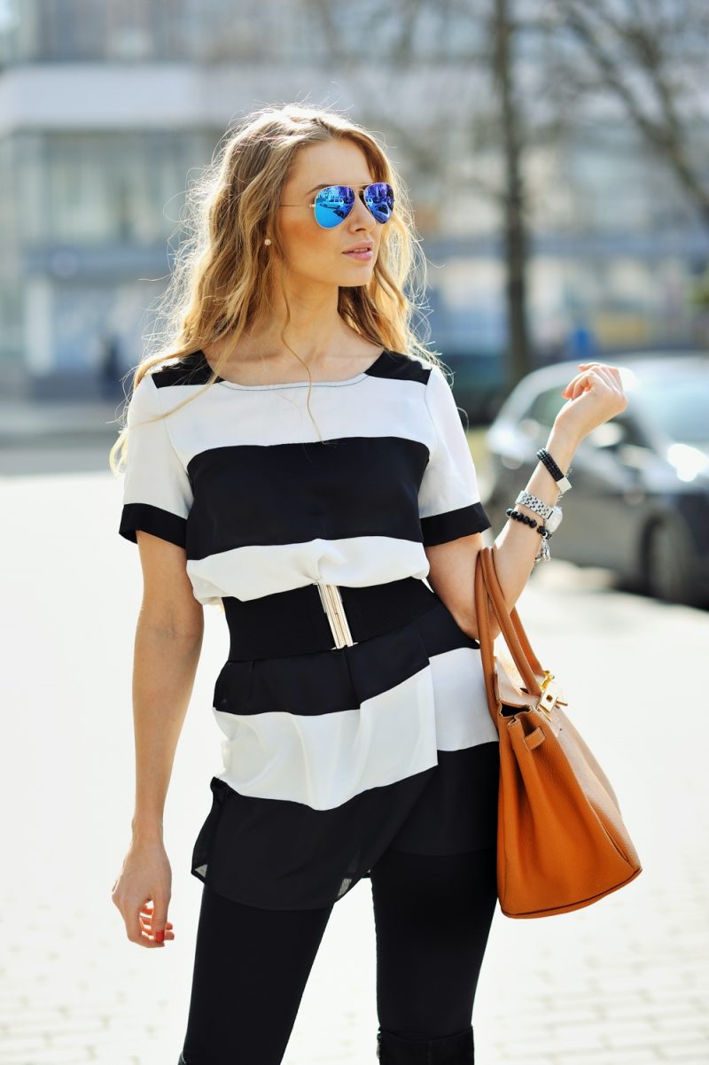 Model Wearing Cute Black and White Look with Blue Aviator Sunglasses