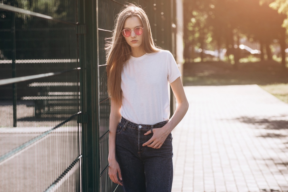 Model Wearing White T-Shirt and Pink Sunglasses