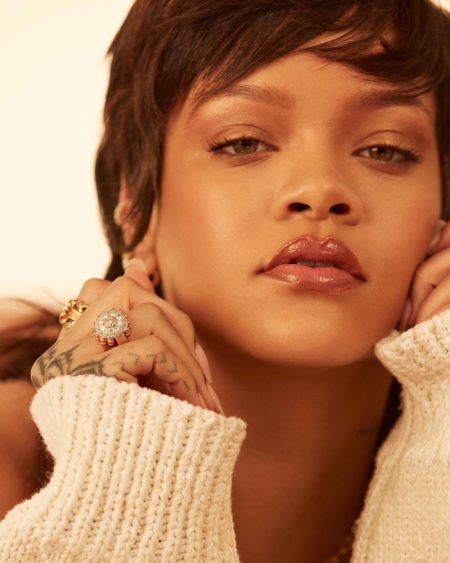 Rihanna Wears Fenty Beauty EAZE Drop Skin Tint Rihanna poses for Fenty Beauty Eaze Drop campaign.