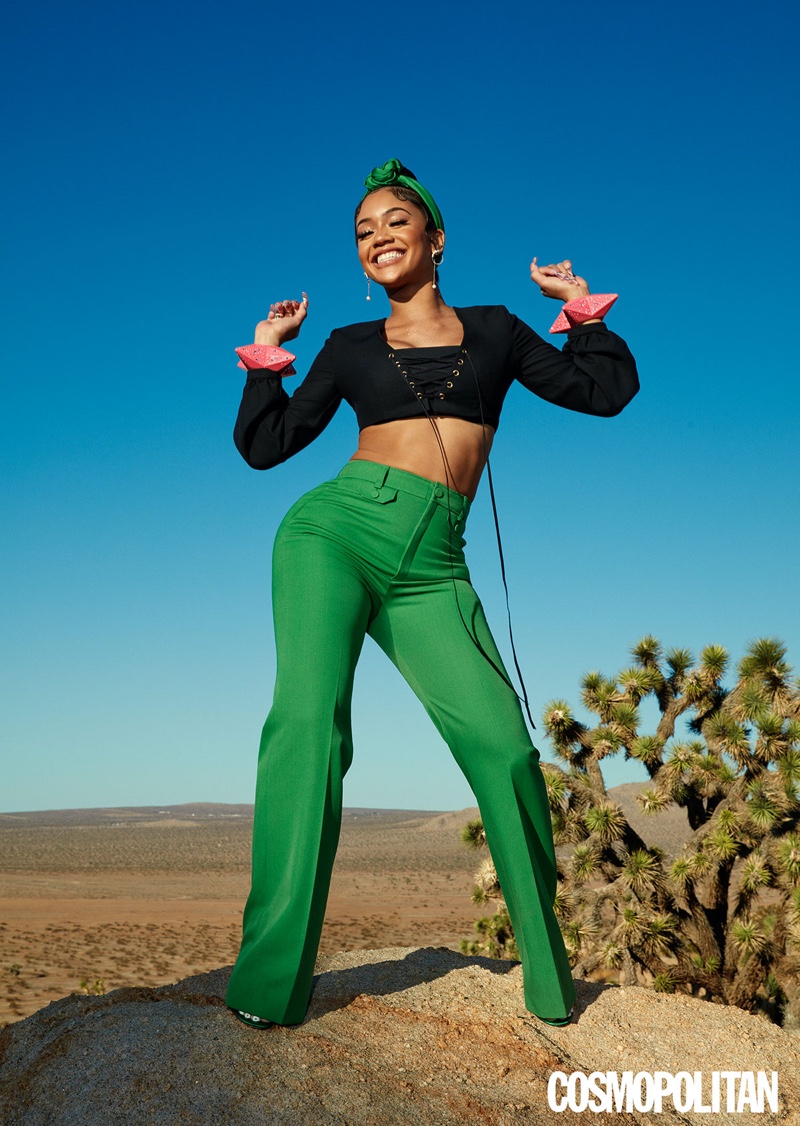 Saweetie rocks Gucci top, pants, carré, and bracelets with Giuseppe Zanotti heels.