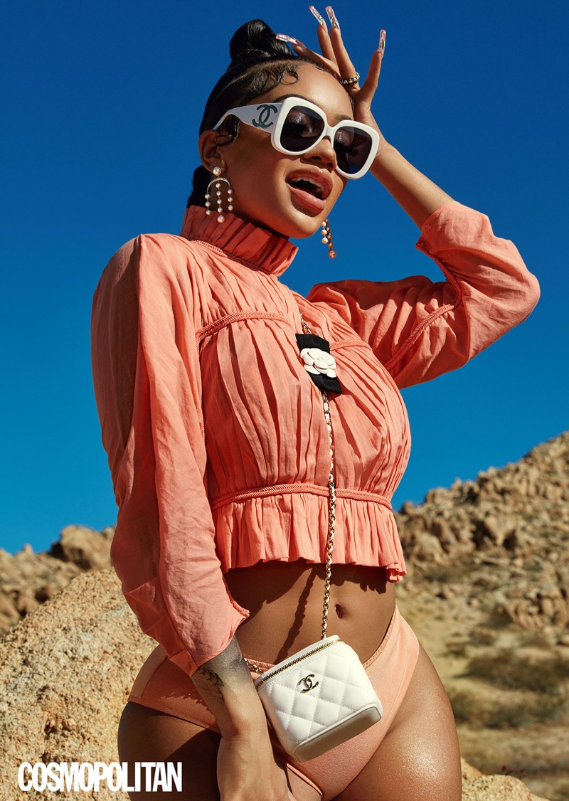 Saweetie poses in the desert for Cosmopolitan photoshoot.