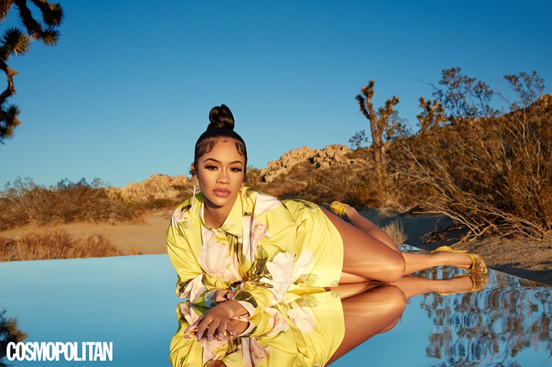 Saweetie lays down in Valentino dress and Gianvito Rossi heels.