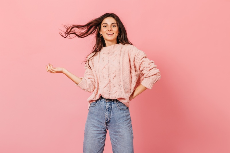 Smiling Model Pink Cableknit Sweater Blue Mom Jeans