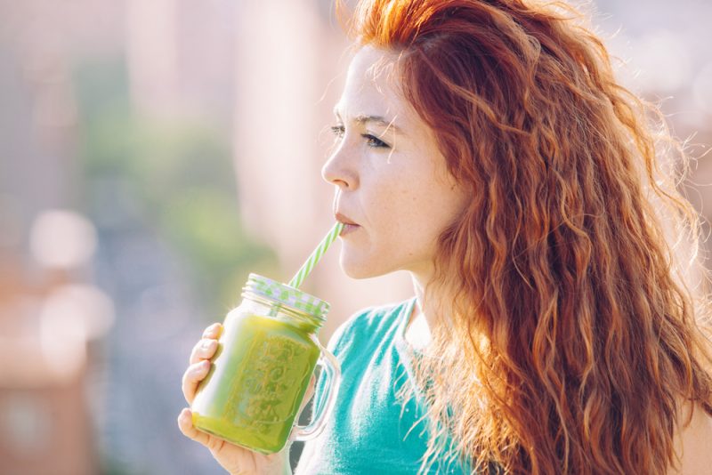 Woman Drinking Green Smoothie