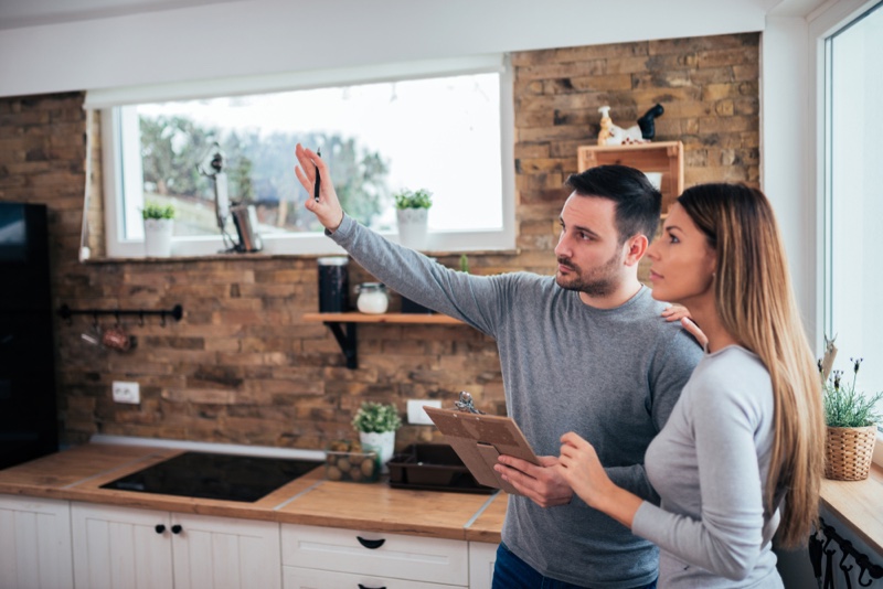 Couple Discussing Home Improvement Plans