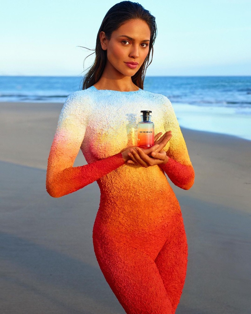Actress Eiza Gonzalez poses in body paint for Louis Vuitton On the Beach fragrance campaign.